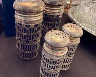 These are two sets of Salt and Pepper Shakers! Sterling Silver over Cobalt Blue Glass! 