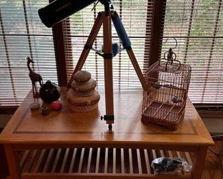 A lovely coffee table, with great accessories! At the center is a wonderful BUSHNELL Telescope with all paperwork and accessories! Would make an OUTSTANDING Christmas Gift for some lucky person! 
