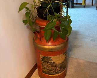 Artistic painted milk can! All house plants are for sale too! 