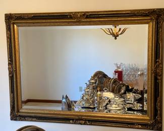 This is a beautiful Gold Framed HEAVY wall mirror! Another exquisite piece that will work with any decor!