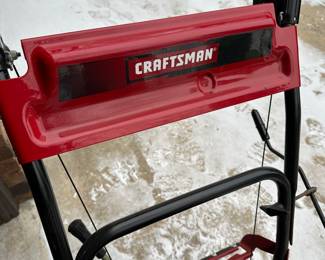 JUST IN TIME! This is a 24" Craftsman Snowblower with Electric Start (And pull start!) We pulled it out of the garage and it started right up! This thing is IMMACULATE! It looks near mint! Check out then pics!