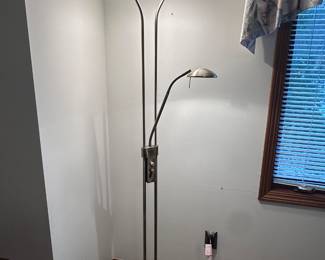A very cool stainless steel floor lamp! Top lamp is stationary, while the arm lamp is adjustable in MANY ways! 