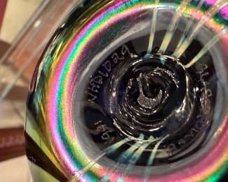 This is a BEAUTIFUL Glass House round paperweight! The colors are stunning! Signed on the bottom!