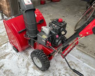 JUST IN TIME! This is a 24" Craftsman Snowblower with Electric Start (And pull start!) We pulled it out of the garage and it started right up! This thing is IMMACULATE! It looks near mint! Check out then pics!