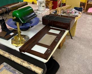 Nice table of usable items, sewing, lamps, etc...