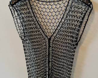 No clothes in this sale at all except for this piece! It is a woman's beaded overlay!