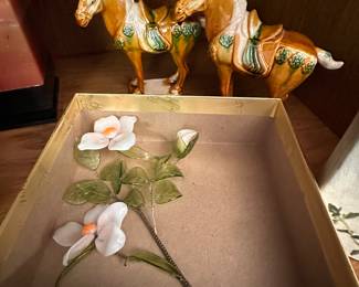 Love the pair of porcelain horses in the back, but the flowers are LOVELY and made of glass! 