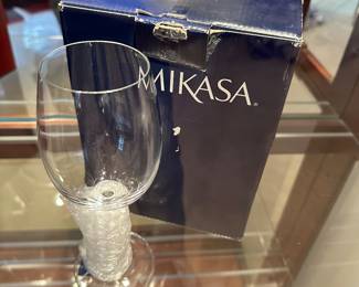 This is a MINT NEW in the original box set of four MIKASA crystal wine glasses!