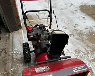 JUST IN TIME! This is a 24" Craftsman Snowblower with Electric Start (And pull start!) We pulled it out of the garage and it started right up! This thing is IMMACULATE! It looks near mint! Check out then pics!