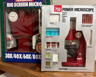 Not surprising we would find scientific microscopes in an estate sale in Midland Michigan! Two sizes, both mint in their original boxes and have all accessories! 