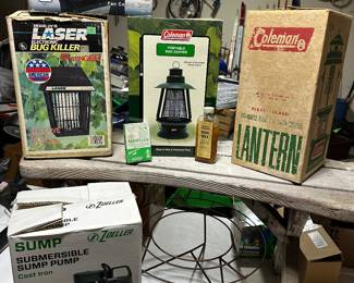 The garage has lots of vintage to new treasures! The Coleman lantern at the left is vintage in its original UNOPENED box! All of these items are in terrific condition! 