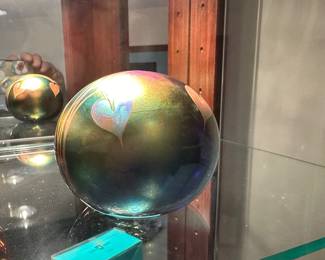 This is a BEAUTIFUL Glass House round paperweight! The colors are stunning! Signed on the bottom!