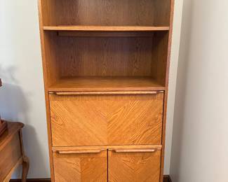 A very nice MCM Secretary! Opens to desk, and has cupboards on the bottom! 