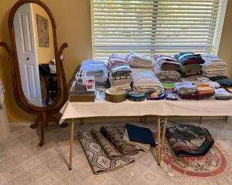 Beautiful oak framed standing mirror, towels, rugs, sewing supplies