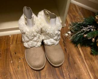 Shoes  & etc. in closet with greenery 