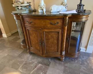 Absolutely wonderful sideboard with marble top and glass display areas on each en - storage and drawer in middle