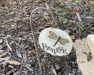 Believe sign at front door