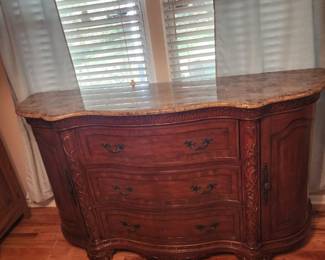 Marble top serpentine sideboard