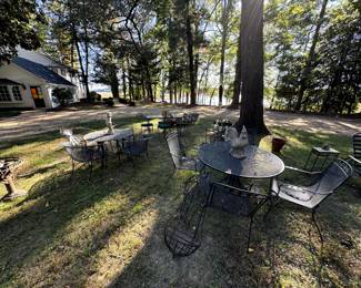 Several nice sets of Rod Iron Furniture along with art for the yard, nice containers and fun yard decor