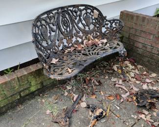 Distressed Cast Iron bench with supply parts to repair. 