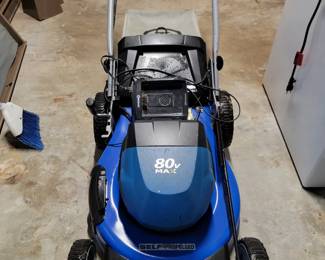Kobalt Brand 80v cordless lawnmower battery is charged & ready to go! Includes charging station. 