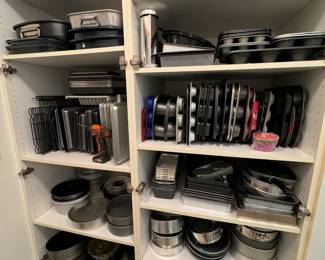 New and barely used baking supplies - cookie sheets, cooling racks, muffin tins, cake pans, bundt pans, specialty pans, paper baking liners, cookie press