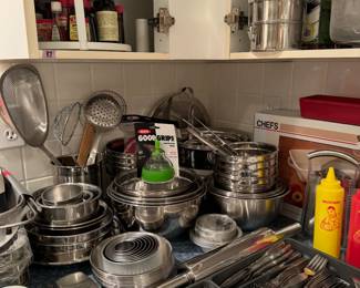 Huge collection of stainless mixing bowls, over 12 different flatware sets