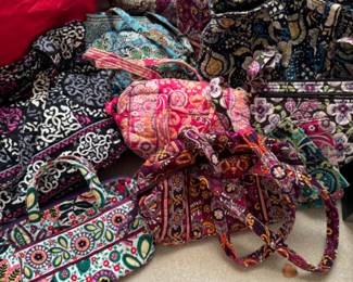 Many Vera Bradley purses that have matching accessories (sunglass case, checkbook cover, wallet, etc)