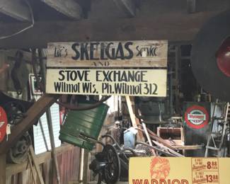 161. Wooden sign for Skelgas stove exchange in Wisconsin . 2 pieces.