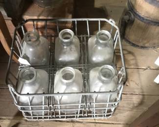 208. Glass milk bottles with carrier