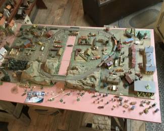 111. Miniature town with many accessories vehicles, people and animals