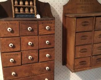 231. Large collection of spice boxes, different sizes and drawer handles.