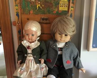253. Dolls, wall mounted seat.