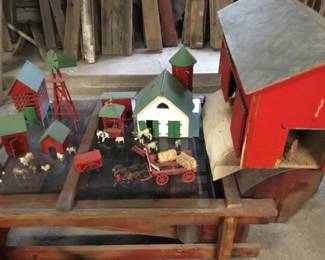 8. Large farm set with several buildings and animals.