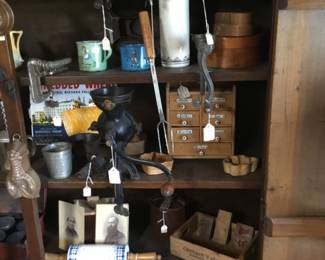 328. Spice boxes, rolling pins, kitchen tools.