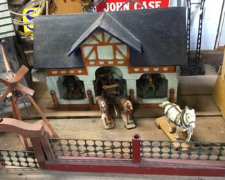 63. Horses, buildings, fences.