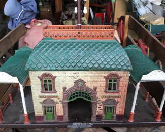 27. Tin train station. We have a huge collection of tin toys available
