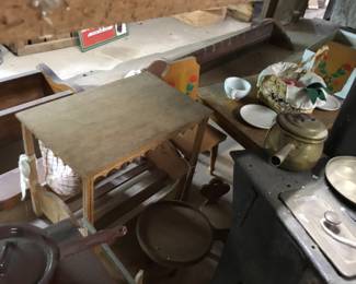 48. Toy kitchen tables and tools