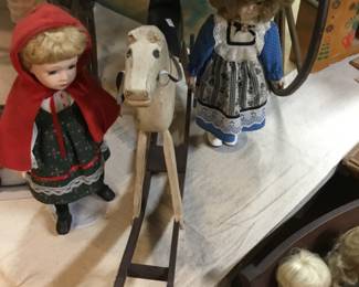 148. Dolls, rocking horses.