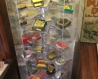 374. Miniature metal advertising boxes.