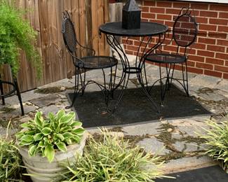 Outdoor furniture; ice cream shop (bistro) table and chairs; plants