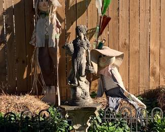 Garden statuary; scarecrows; bottle tree