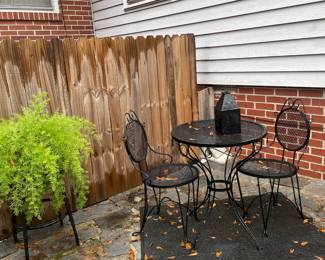 Outdoor furniture; ice cream shop (bistro) table and chairs; plants