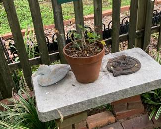 Pieces of granite; bricks; outdoor items