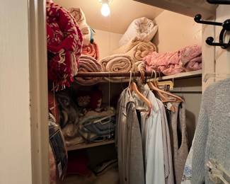 Clothes, quilts, linens to sort through