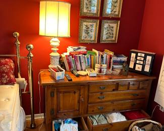 Dresser. Lamp. Prints