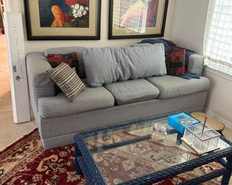 Coffee table. Prints. Rug. Sofa