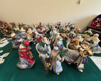 Thomas Kinkade santa ornaments. 