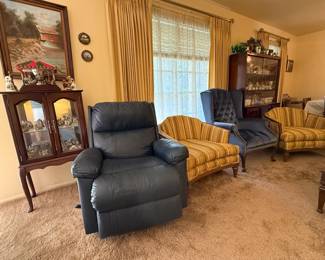 Living Room Lounge Chairs and various wall hangings
