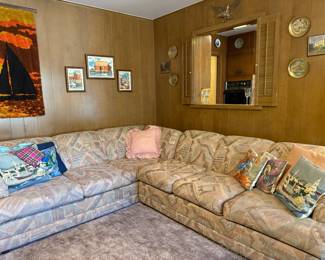 Sectional Couch, Water Color paintings, Brass wall plates, Brass wall plates